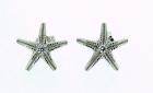 Orecchini stelle marine in oro bianco e brillanti ct. 0.10
